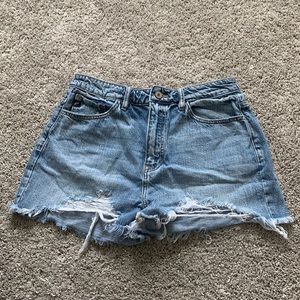 High waisted light wash distressed denim shorts